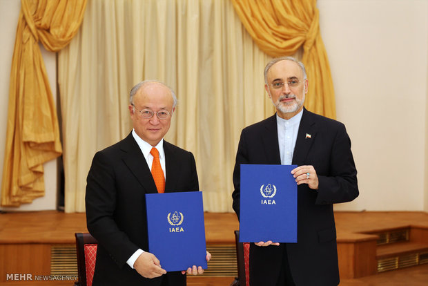 امضاءتوافقنامه بین روسای انرژی اتمی ایران وآژانس بین المللی اتمی