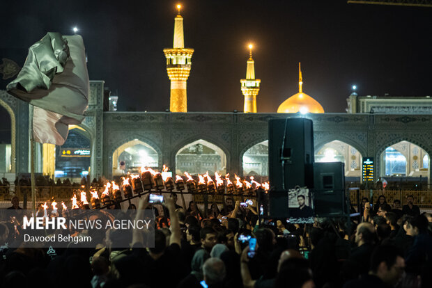 آیین مشعل گردانی شب تاسوعا در مشهد آیین مشعل گردانی شب تاسوعا در مشهد