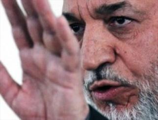 انتقاد حامد کرزای و تمجدید ناتو از ادامه حضور آمریکا در افغانستان