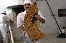 دولت قیمت نان را آزاد کند/ ۲ هزار میلیارد تومان؛ میزان ضایعات نان