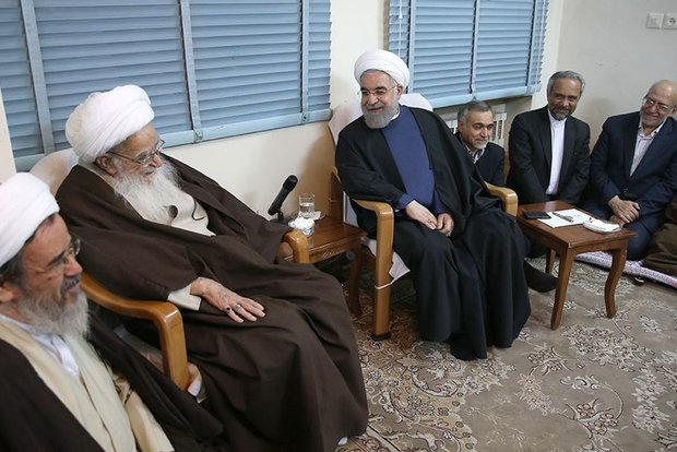 President Rouhani visits Qom