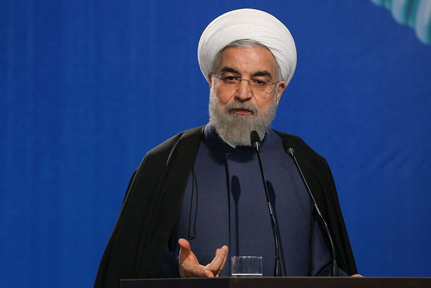 President Rouhani visits Qom