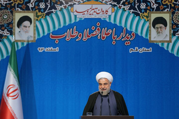 President Rouhani visits Qom