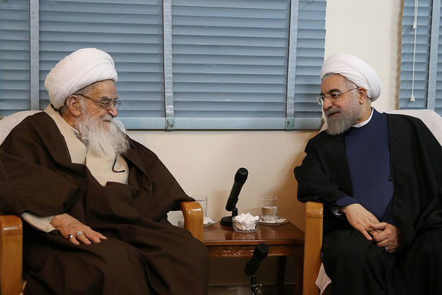 President Rouhani visits Qom