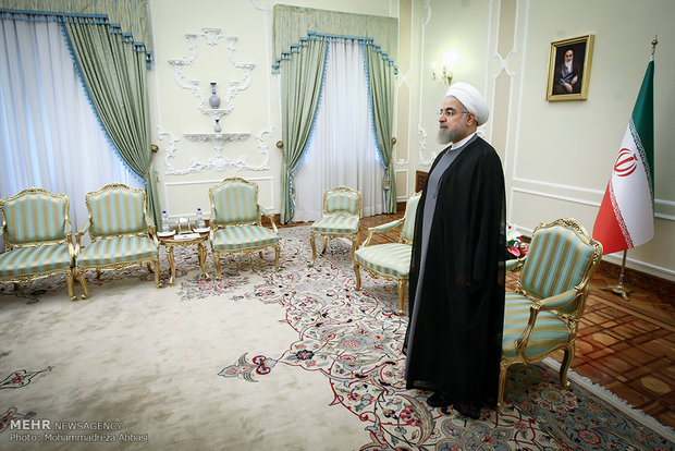 President Rouhani, Syrian official meet