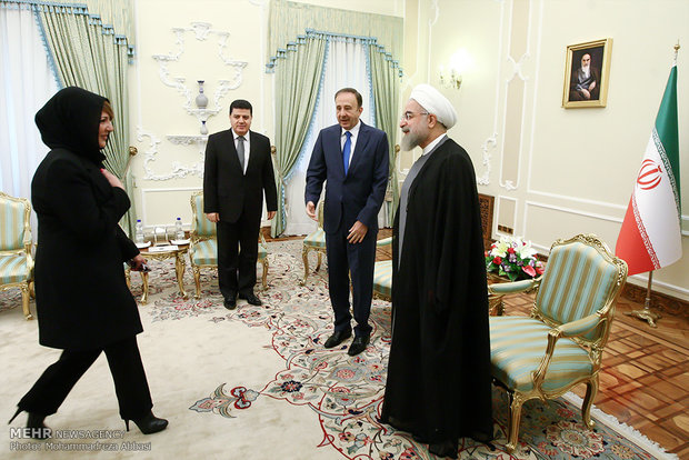 President Rouhani, Syrian official meet