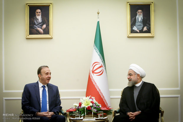 President Rouhani, Syrian official meet