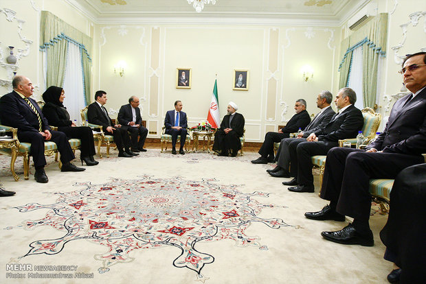 President Rouhani, Syrian official meet