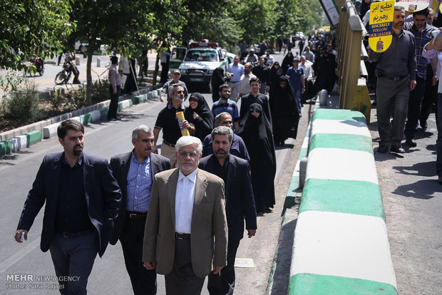 Officials participate in Intl. Quds Day demos.