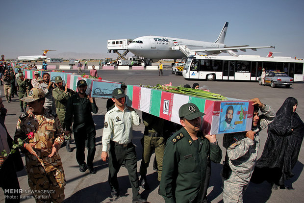 استقبال از 10 شهید گمنام در فرودگاه بین المللی شهید هاشمی نژاد مشهد
