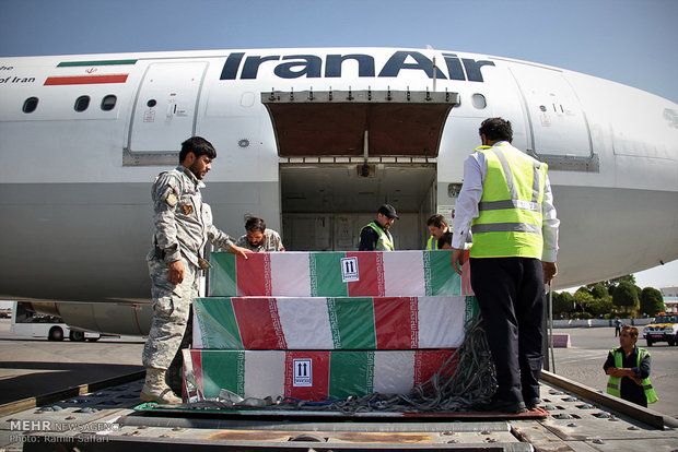 استقبال از 10 شهید گمنام در فرودگاه بین المللی شهید هاشمی نژاد مشهد