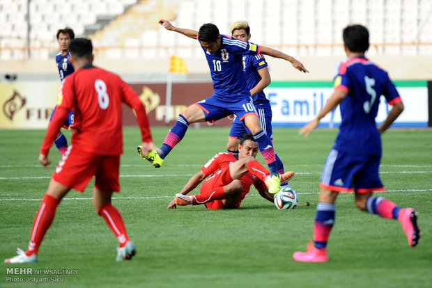 Japan, Afghanistan match in frames