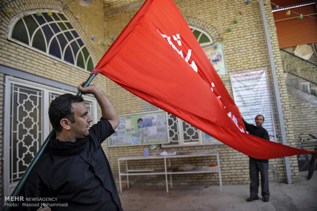 برافراشته شدن پرچم حرم مطهر ابوالفضل العباس در روستای ابوذر شهرستان شوش دانیال‎