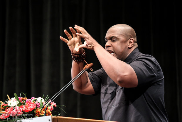 Amir Suleiman, dramatizing part of his address in the opening ceremony. 