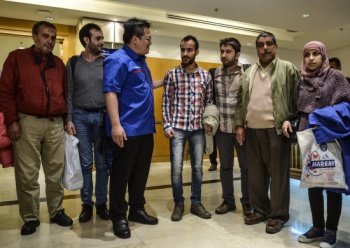 First Refugees From Syria Arrive In Malaysia Mehr News Agency