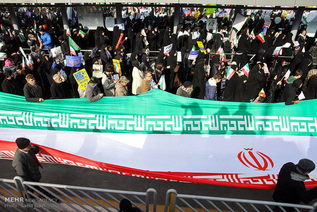 People in Qom, Mashad celebrate Feb. 11 anniversary