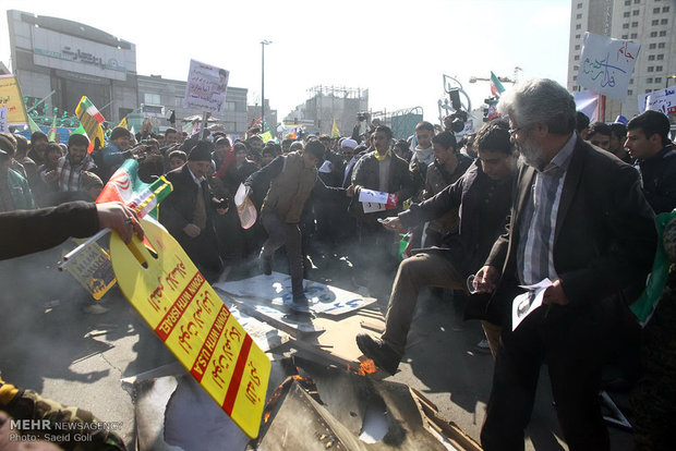 People in Qom, Mashad celebrate Feb. 11 anniversary