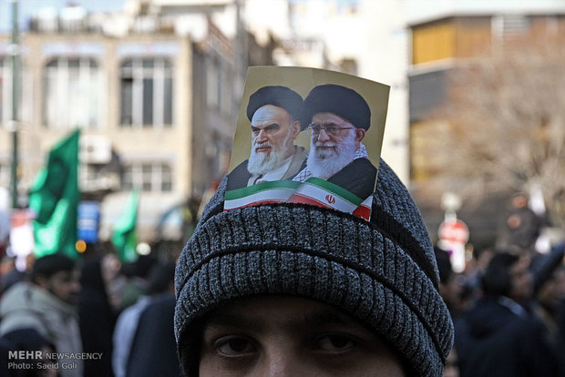 People in Qom, Mashad celebrate Feb. 11 anniversary