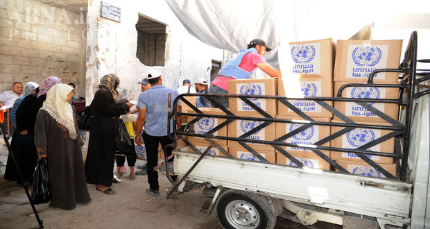 Food packages distributed to displaced locals of Yarmouk Camp