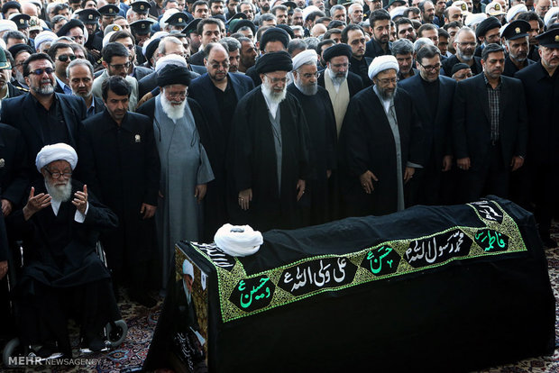 Leader leads prayers on body of Ayat. Vaez Tabasi