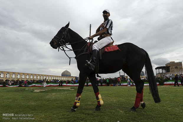 Playing polo at Naghsh-e Jahan Sq. in Isfahan