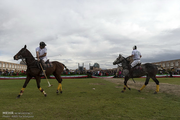 Playing polo at Naghsh-e Jahan Sq. in Isfahan