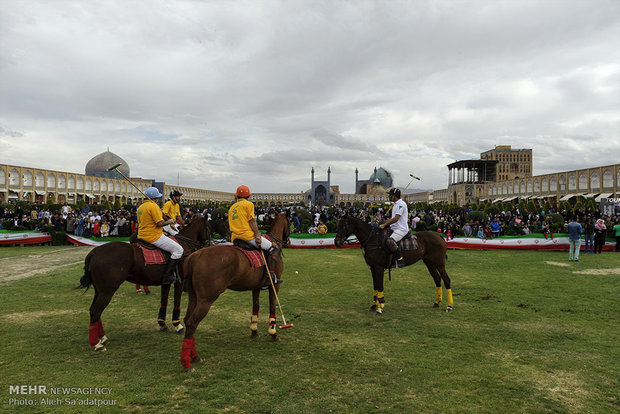 Playing polo at Naghsh-e Jahan Sq. in Isfahan