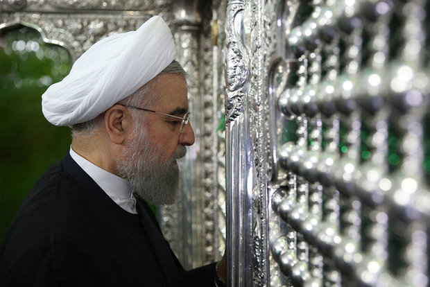 President Rouhani visits Qom