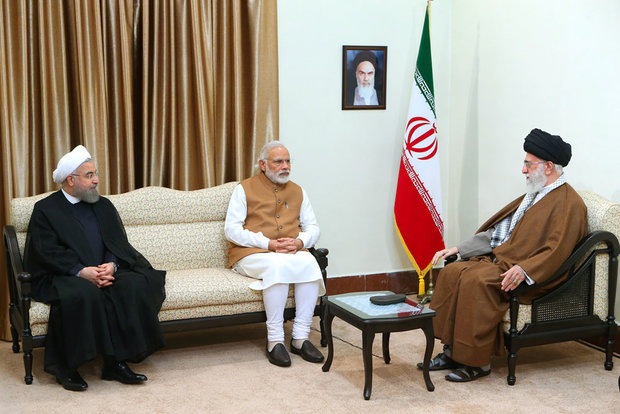 Leader receives Indian PM and Afghan President