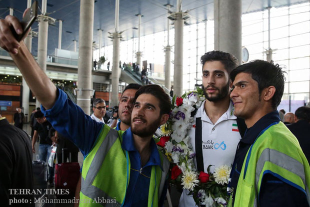 Iran volleyball team 'bring home the bacon'
