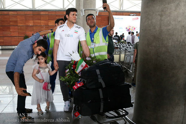 Iran volleyball team 'bring home the bacon'