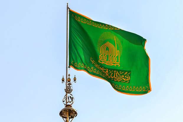 Razavi holy shrine's flag presented to Sheikh Zakzaky