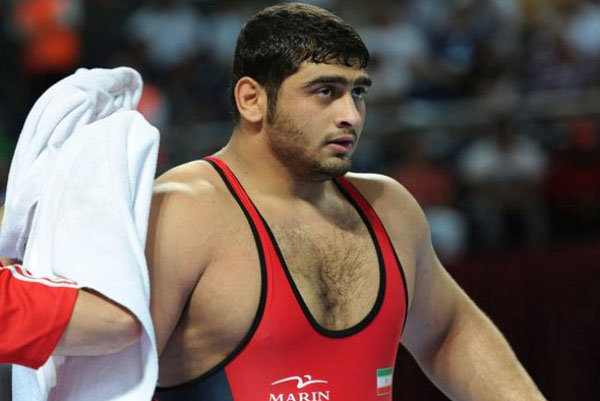 Babajanzadeh wins 130kg first round match