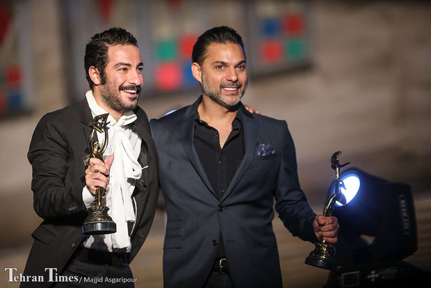 Actor Navid Mohammadzadeh, (right) actor Peyman Moaadi attends the Iran Cinema Celebration in Tehran’s Mashq Square on September 12, 2016.