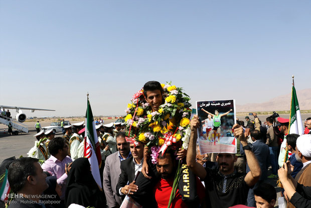 Iranian Paralympians welcomed at home