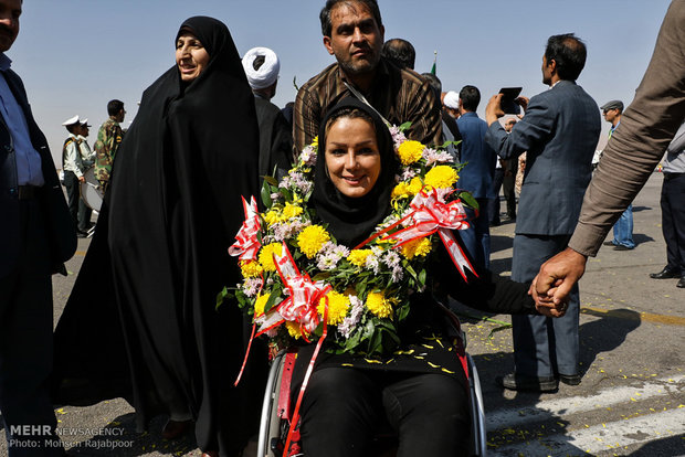 Iranian Paralympians welcomed at home