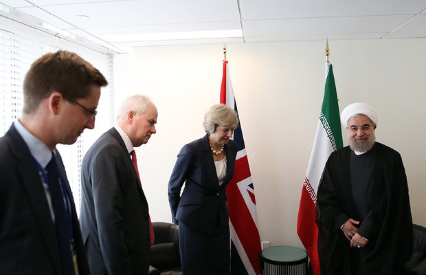 Iran’s Rouhani (R) in a meeting with British Prime Minister Theresa May (M) on Tuesday on the sidelines of the 71st United Nations General Assembly in New York.