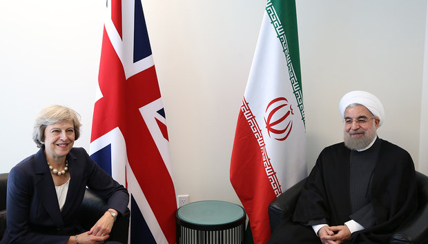 Iran’s Rouhani (R) in a meeting with British Prime Minister Theresa May (L) on Tuesday on the sidelines of the 71st United Nations General Assembly in New York.