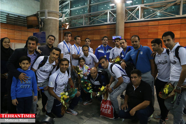 Iran futsal team returns home after finishing third at FIFA World Cup