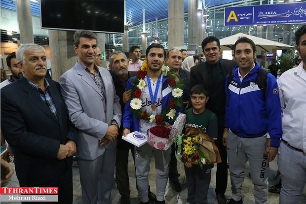 Iran futsal team returns home after finishing third at FIFA World Cup