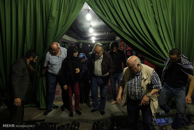 German tourists attend Imam Hossein mourning ceremony