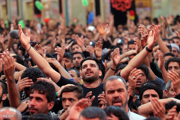 Karbala; Shrine of Imam Hussein embraced by swarms of pilgrims