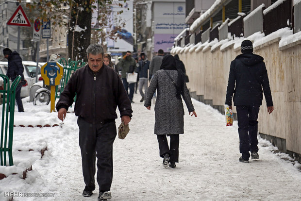 Snow whitens Tehran