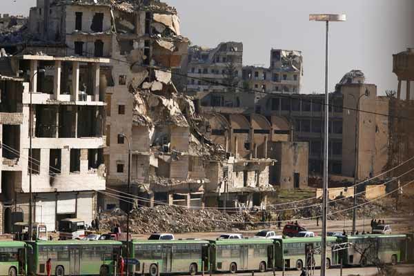 Second convoy with evacuees leaves east Aleppo

