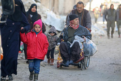 More residents flee Aleppo eastern neighborhoods for army posts