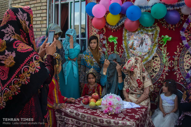 A reception party is given one day before the wedding ceremony when the groom’s family bring gifts for the bride. The groom does not attend this ceremony.