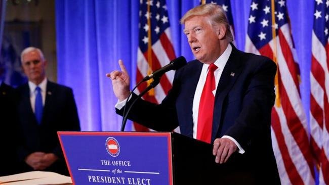 US President-elect Donald Trump argues with CNN's Jim Acosta during a news conference in the lobby of Trump Tower in New York City, January 11, 2017. (Photo by Reuters)
