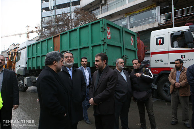 Rouhani visits building collapse site