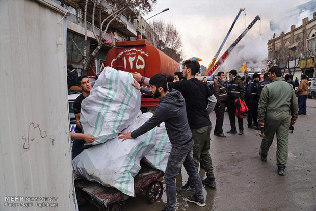 تخلیه مغازه های مجاور ساختمان پلاسکو