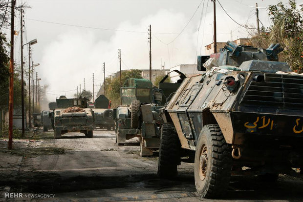 القوات الامنية العراقية تقترب من المجمع الحكومي الرئيسي غرب الموصل